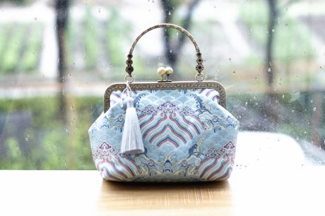 復(fù)古氣質(zhì)優(yōu)雅海崖風布包手工包